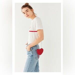 Urban Outfitters “Rachel Icon” crossbody heart bag